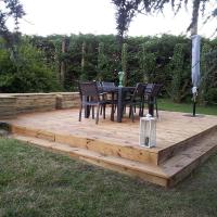 Location vacances La Barillère : terrasse privée dans le jardin